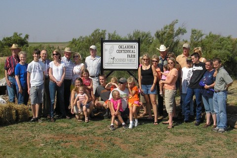 Family at the sign unveiling